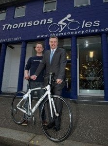 Martin Johnston, manager at Thomson Cycles in Causeyside Street, Paisley is gearing up for busy times ahead after the business got a helping hand with a whopping £10,000 improvement grant from Renfrewshire Council to give the entrance to the shop a makeover. He is pictured with council leader Mark Macmillan who called in to see the changes. 