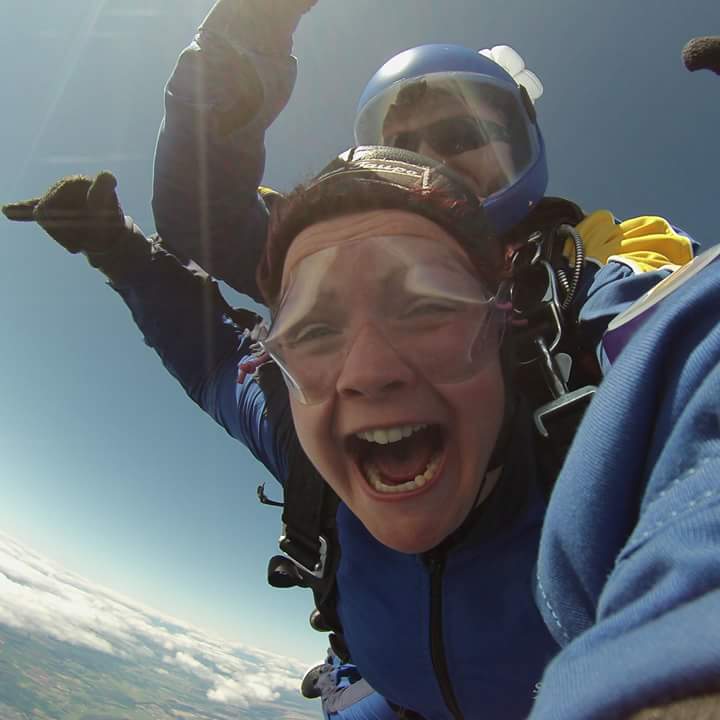 Breast cancer survivor Claire Ann McCallum skydiving in New Zealand