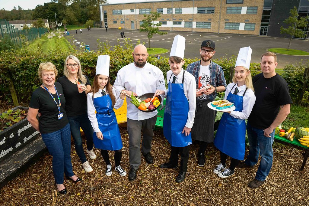 (L-R) Linwood High School Head Teacher Eileen Young, Director of the TTA Stephanie Wade, pupil Necole Wilson (14), Kained Holdings Group Development Chef Scott Leask, pupil Evan Thompson (17), Kyle Steel of pop-up restaurant Section 33, pupil Emile McEwan (14) and Tree of Knowledge Director Dougie Clark at the Taste the Industry event at Linwood High School