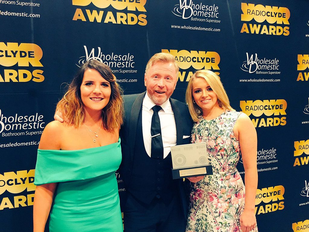 Winners - General manager at intu Braehead Gary Turnbull with marketing manager, Christine Macdonald, left and Braehead Arena operations manager, Lauren Little