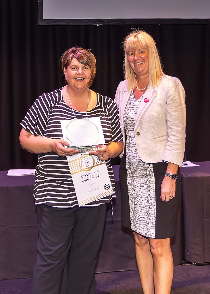 enga McLeod receives her Chief Executive’s Award from Joyce McKellar