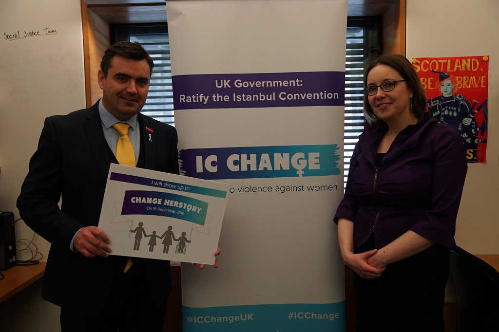  Gavin Newlands MP and Eilidh Whiteford MP hold a sign to show support for the IC Change Campaign to end violence against women