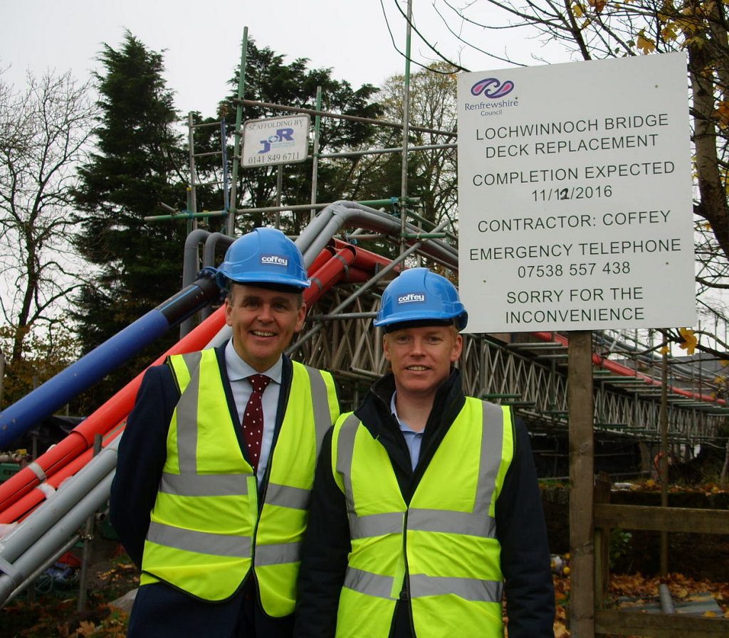 Irish Minister for the Diaspora and International Development, Joe McHugh TD (left) take a look at the Coffey Construction bridge project at Lochwinnoch with company Managing Director,  Odran Madden.
