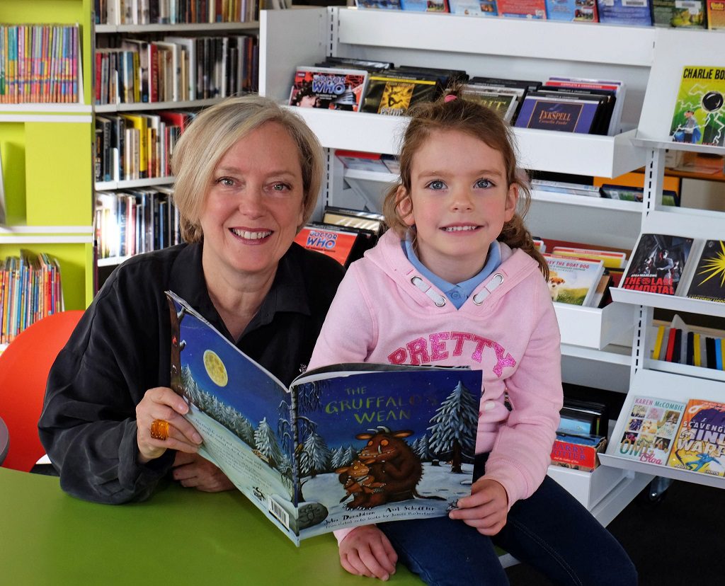 Janice Forsyth and four-year-old Millie Fox before the live radio show was broadcast from Johnstone Library.
