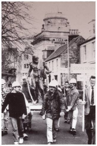Procession of Diogenes Statue through Paisley