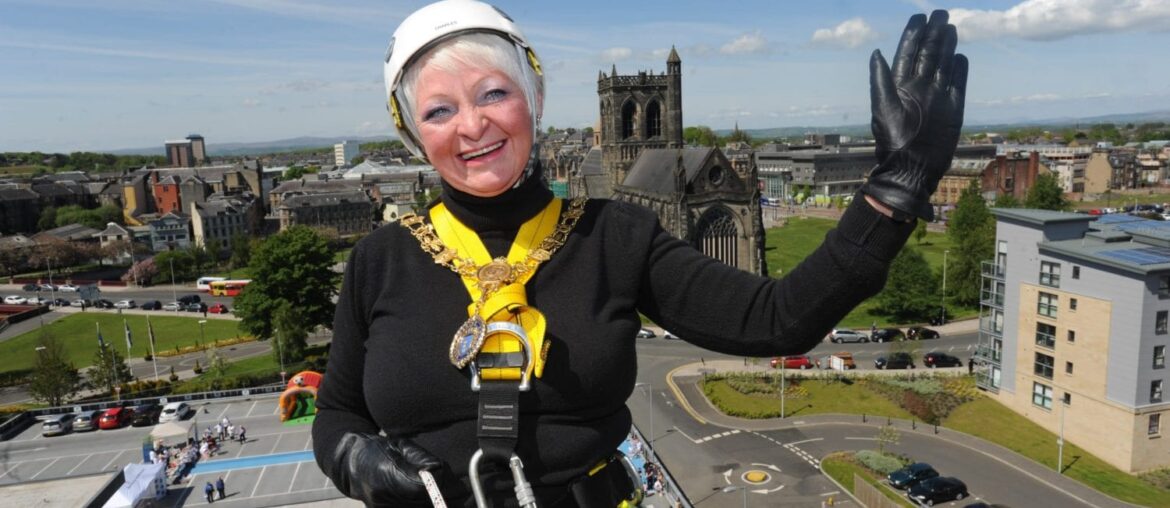 Provost Hall starting her abseil