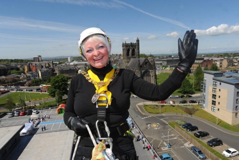 Provost Hall starting her abseil