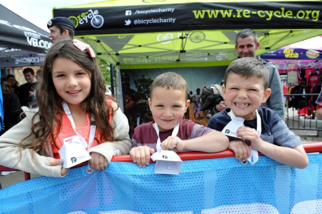 Velodrome 31 crowd ringing cow bells L-R Caitlin 8, Seamus (5) and Ciaran (7) Murney from Johnstone.