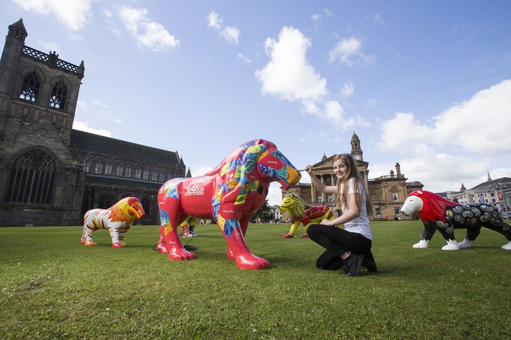 07/07/16.... PAISLEY. colourful painted life-size lion sculptures created as part of the biggest public art project in PaisleyÕs history. The Pride of Paisley Wild in Art Project is taking place as part of the townÕs bid for UK City of Culture 2021 and has seen 25 lions - inspired by popular Paisley Museum exhibit Buddy the Lion Ð created and individually painted by local artists and schools Erin Lafferty,