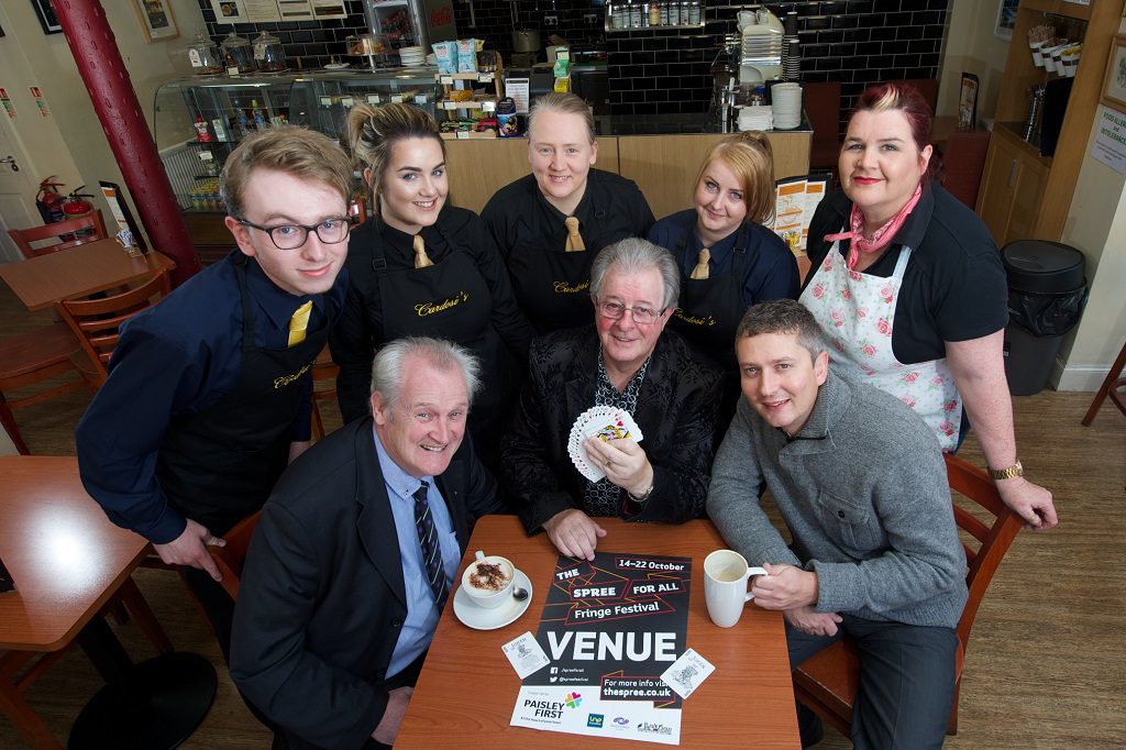 Magicians Tommy Templar and Stevo with staff from Cardosi's espress bar and Ta Ta Bella's tearoom and Andrew Mitchell from Paisley First