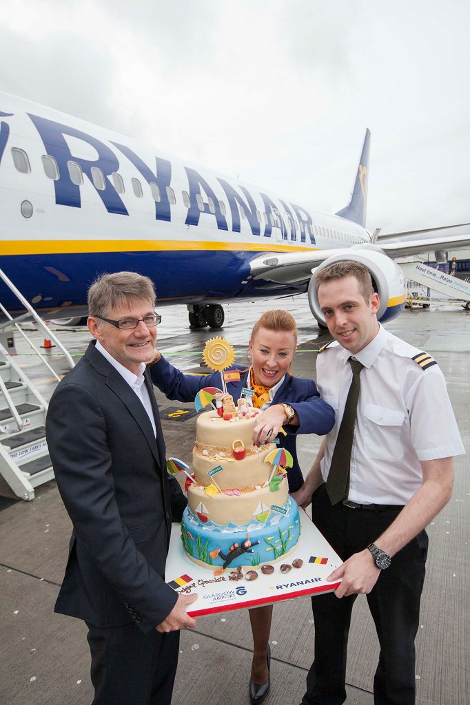 Glasgow Airport’s Paul White with Ryanair cabin crew member Lynsey Sloan and first officer Adam Sutton