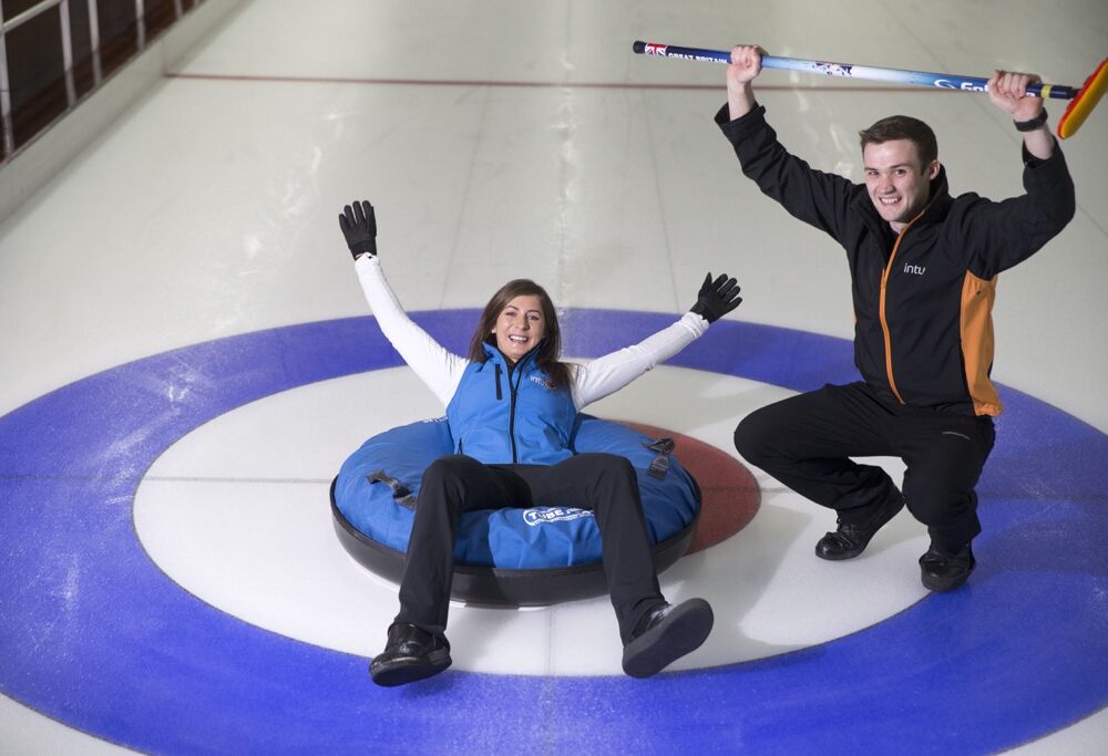 Olympic ice star Eve brushes up on her HUMAN curling skills