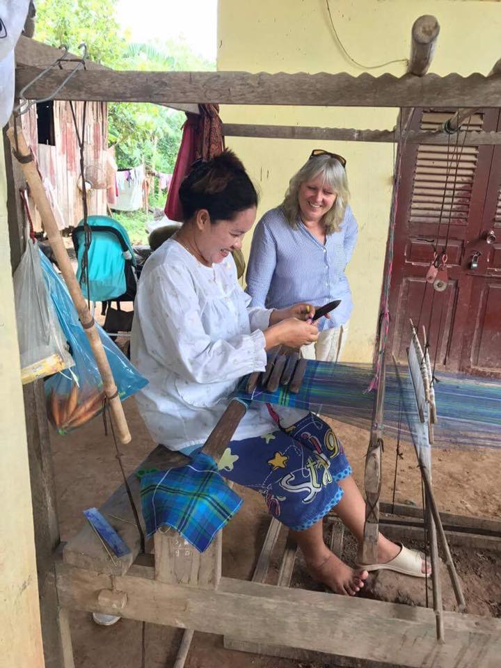 Eve Broadis with master weaver in Cambodia