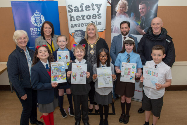 Safe Kids poster winners with the partners involved