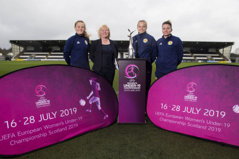 Scotland stars Erin Cuthbert (l) and Jo Love (r) join U19s Coach Pauline Hamill and Captain Amy Muir to promote the tournament