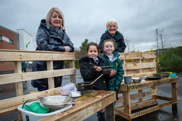 Gail Scoular, Cllr Cathy McEwan, and a Cochrane Castle Primary & St David's Primary pupil