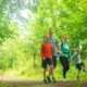 Family walking in Castle Semple Woodlands - Clyde Muirshiel Regional Park