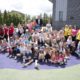 Group shot Convener M McGurk with kids and staff at St James' summer club in Renfrew - 27 Jul 2022 (2)