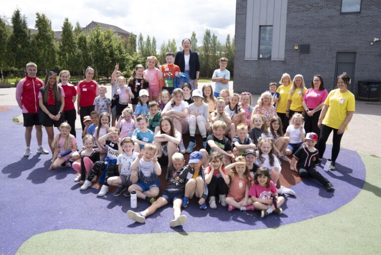 Group shot Convener M McGurk with kids and staff at St James' summer club in Renfrew - 27 Jul 2022 (2)