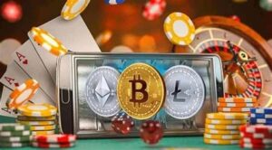 A smartphone displays cryptocurrency symbols for Ethereum, Bitcoin, and Litecoin, surrounded by poker chips, playing cards, and a roulette wheel, representing online crypto gambling.