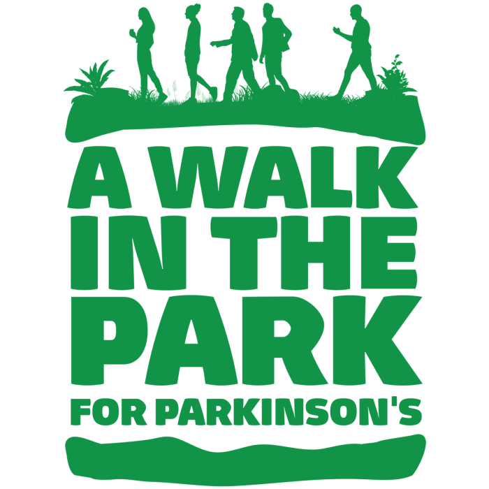 Green graphic with silhouettes of people walking on grass above bold text: "A WALK IN THE PARK FOR PARKINSON'S.