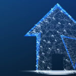 A digital illustration of a house and computer mouse cursor, both formed by interconnected glowing blue dots and lines, symbolizing technology and online real estate, on a dark blue background.